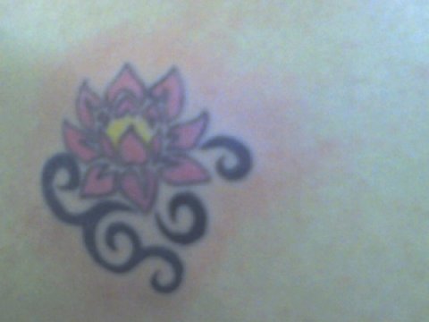 Amber - Tribal lotus: real inked placement tattoo photo thumbnail
