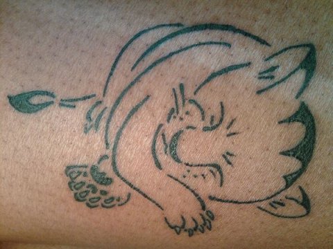 Kenya - Sleeping lion cub: real inked placement tattoo photo thumbnail