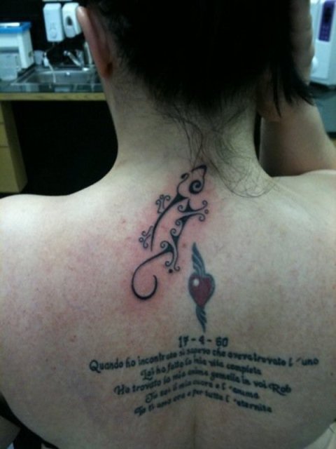 Leonie - Upper back: real inked placement tattoo photo thumbnail