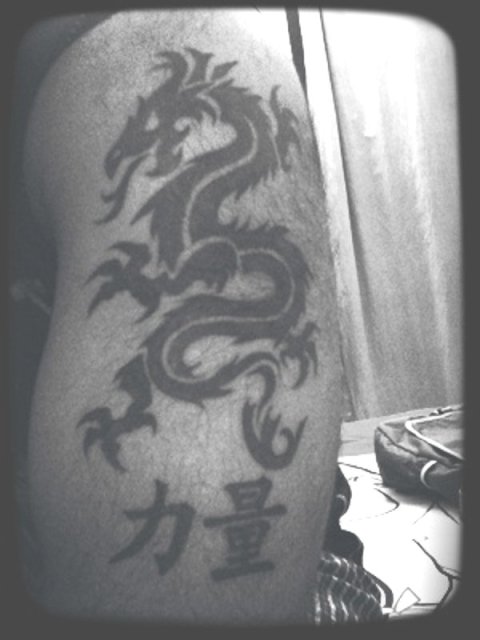Manoj - Tribal Dragon: real inked placement tattoo photo thumbnail