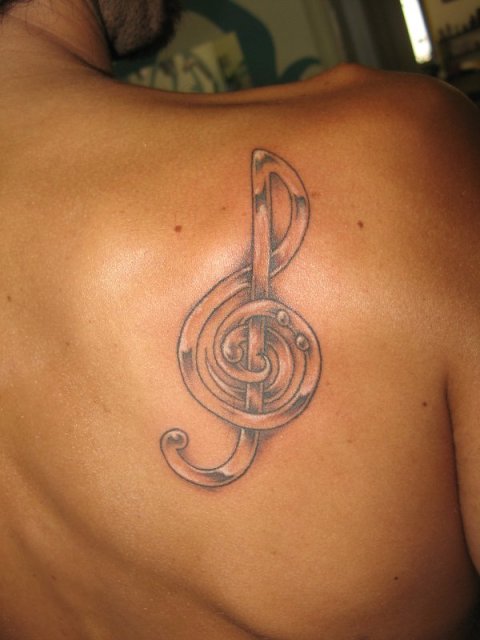 Nunzio - Musical clefs: real inked placement tattoo photo thumbnail