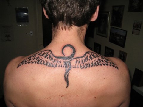 Paul - Winged ankh: real inked placement tattoo photo thumbnail