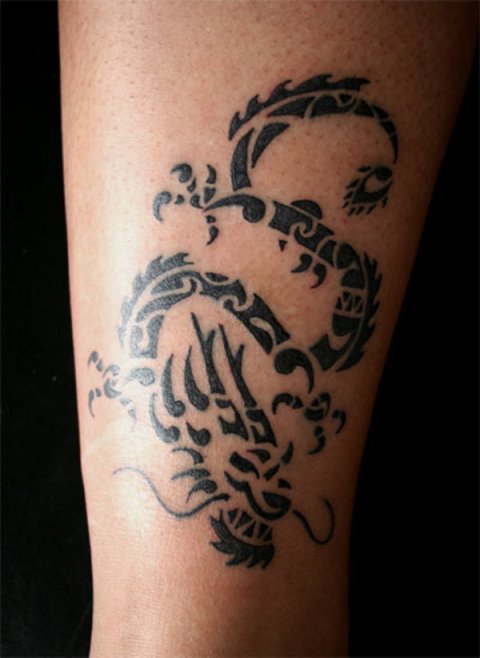 Shivani - Polynesian dragon: real inked placement tattoo photo thumbnail